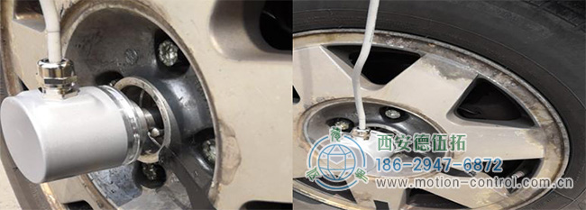 图为编码器测量汽车车轮转速的应用照片